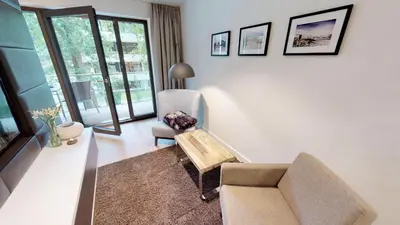 Ein Sitzbereich in der Unterkunft White Pearl Apartment 1.10