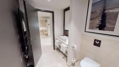 Ein Badezimmer in der Unterkunft White Pearl Apartment 1.06