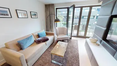Ein Sitzbereich in der Unterkunft White Pearl Apartment 1.03