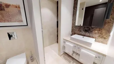 Ein Badezimmer in der Unterkunft White Pearl Apartment 0.01