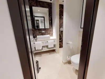 Ein Badezimmer in der Unterkunft White Pearl Apartment 0.14