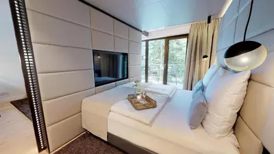 Ein Bett oder Betten in einem Zimmer der Unterkunft White Pearl Apartment 1.05