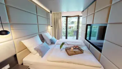 Ein Bett oder Betten in einem Zimmer der Unterkunft White Pearl Apartment 1.15