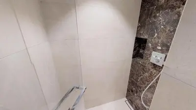 Ein Badezimmer in der Unterkunft White Pearl Apartment 1.15