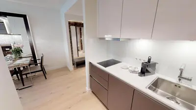 Küche/Küchenzeile in der Unterkunft White Pearl Apartment 1.15