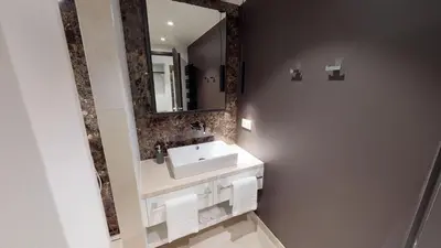 Ein Badezimmer in der Unterkunft White Pearl Apartment 1.15
