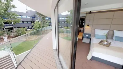 Ein Bett oder Betten in einem Zimmer der Unterkunft White Pearl Apartment 1.01