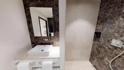 Ein Badezimmer in der Unterkunft White Pearl Apartment 0.08