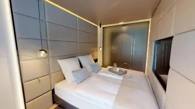 Ein Bett oder Betten in einem Zimmer der Unterkunft White Pearl Apartment 0.08