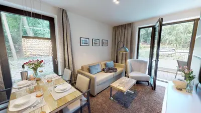 Ein Sitzbereich in der Unterkunft White Pearl Apartment 0.08