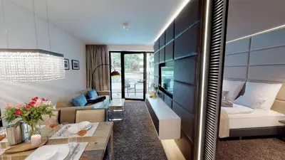 Ein Bett oder Betten in einem Zimmer der Unterkunft White Pearl Apartment 0.09