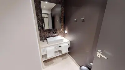 Ein Badezimmer in der Unterkunft White Pearl Apartment 0.10