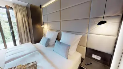 Ein Bett oder Betten in einem Zimmer der Unterkunft White Pearl Apartment 1.02