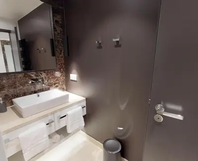 Ein Badezimmer in der Unterkunft White Pearl Apartment 0.15