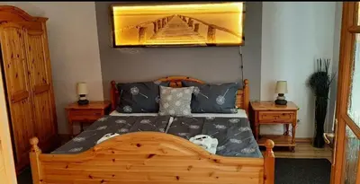 Ein Bett oder Betten in einem Zimmer der Unterkunft MIRA