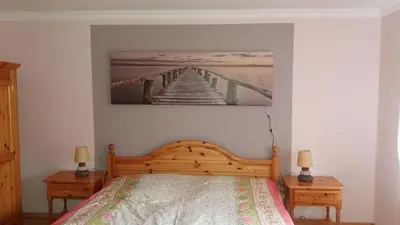 Ein Bett oder Betten in einem Zimmer der Unterkunft MIRA