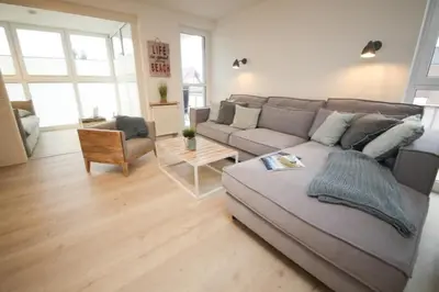 Ein Sitzbereich in der Unterkunft Ferienwohnung WEST COAST
