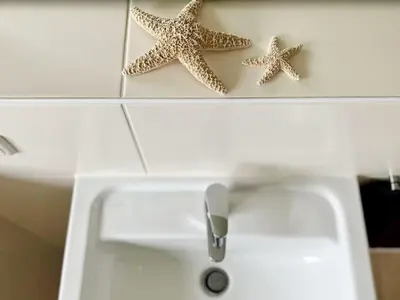 Ein Badezimmer in der Unterkunft 