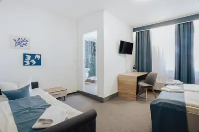 Ein Bett oder Betten in einem Zimmer der Unterkunft Hotel Wiggers