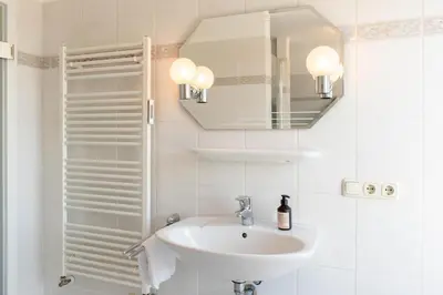 Ein Badezimmer in der Unterkunft Ferienwohnung Viermaster