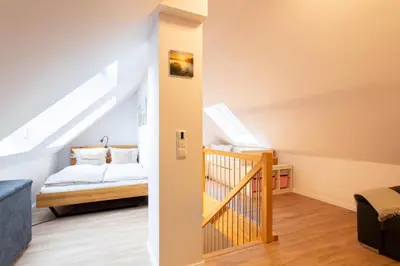 Ein Bett oder Betten in einem Zimmer der Unterkunft Ferienwohnung dat Seepeerdje