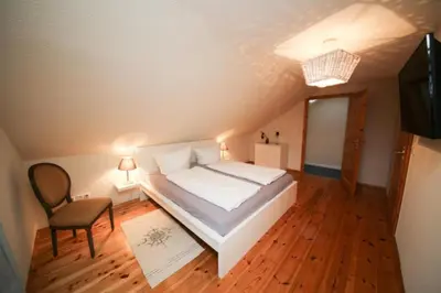 Ein Bett oder Betten in einem Zimmer der Unterkunft Ferienwohnung Hansa Lounge 18