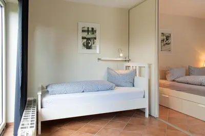 Ein Bett oder Betten in einem Zimmer der Unterkunft Ferienwohnung Hansa Lounge 18
