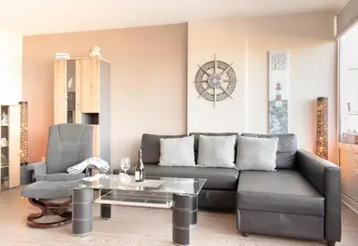 Ein Sitzbereich in der Unterkunft Ferienwohnung Strandhotel App. 105