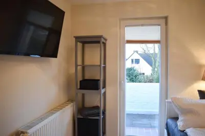 Ein Bett oder Betten in einem Zimmer der Unterkunft Ferienwohnung Hansa Lounge 20