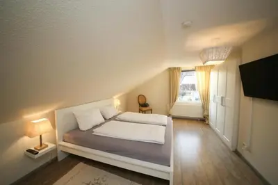 Ein Bett oder Betten in einem Zimmer der Unterkunft Ferienwohnung Hansa Lounge 20