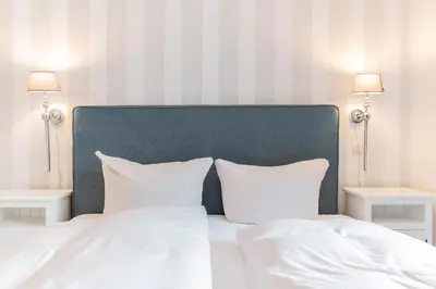 Ein Bett oder Betten in einem Zimmer der Unterkunft Ferienwohnung Hansa Lounge 20a