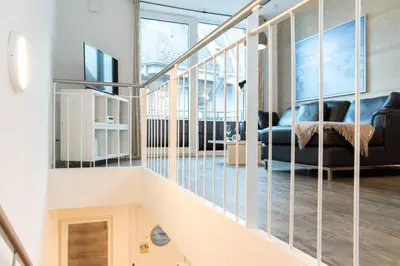 Ein Bett oder Betten in einem Zimmer der Unterkunft Ferienwohnung Hafenkante