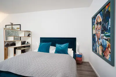 Ein Bett oder Betten in einem Zimmer der Unterkunft Appartementhaus Terrassenhügel Strandsuite