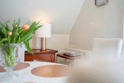 Ein Sitzbereich in der Unterkunft Ferienwohnung Birkenallee 55