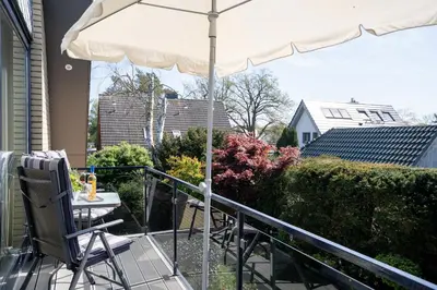 Ein Balkon oder eine Terrasse in der Unterkunft Ferienwohnung Birkenallee 55