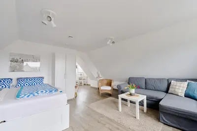 Ein Sitzbereich in der Unterkunft Ferienwohnung Fährblick Moba-Travel