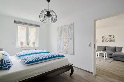 Ein Bett oder Betten in einem Zimmer der Unterkunft Ferienwohnung Hafeneck Moba-Travel