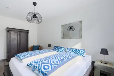 Ein Bett oder Betten in einem Zimmer der Unterkunft Ferienwohnung Hafeneck Moba-Travel