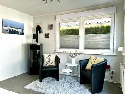 Ein Sitzbereich in der Unterkunft Haus Seeblick Ferienhaus Priwall
