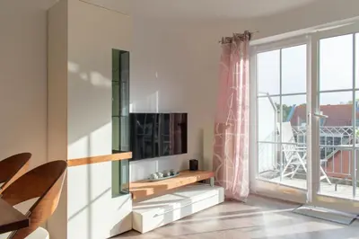 Ein Sitzbereich in der Unterkunft Ferienwohnung Wolkenfreude