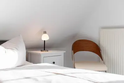 Ein Bett oder Betten in einem Zimmer der Unterkunft Ferienwohnung Wolkenfreude