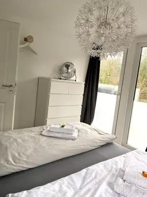 Ein Bett oder Betten in einem Zimmer der Unterkunft BUDE 17
