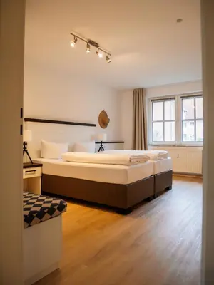 Ein Bett oder Betten in einem Zimmer der Unterkunft App Ostseestern