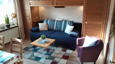 Ein Sitzbereich in der Unterkunft Ferienwohnung 