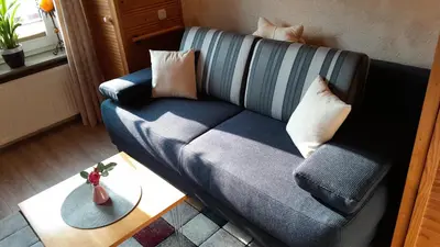Ein Sitzbereich in der Unterkunft Ferienwohnung 