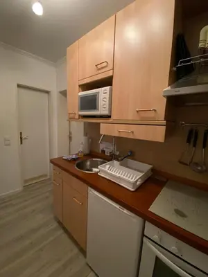 Küche/Küchenzeile in der Unterkunft Ferienwohnung Juchmann *Zentrale/ strandnahe/ ruhige Lage*