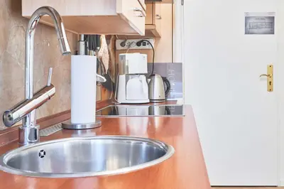 Küche/Küchenzeile in der Unterkunft Ferienwohnung Juchmann *Zentrale/ strandnahe/ ruhige Lage*