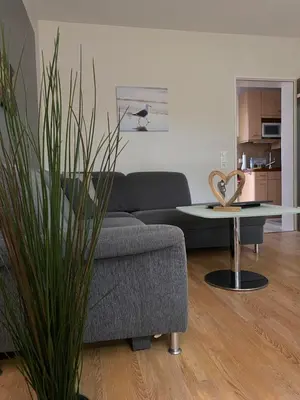 Ein Sitzbereich in der Unterkunft Ferienwohnung Juchmann *Zentrale/ strandnahe/ ruhige Lage*