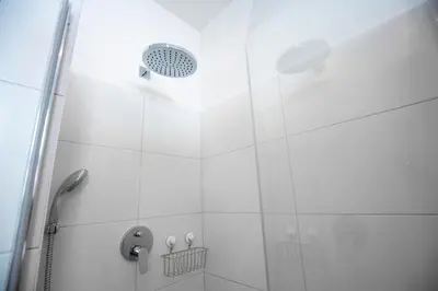 Ein Badezimmer in der Unterkunft Haus Albatros Ferienwohnungen