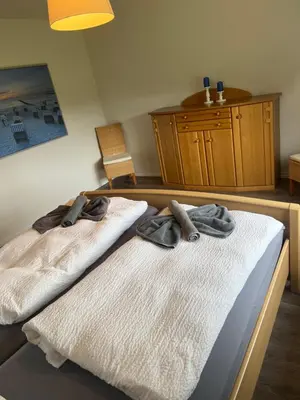Ein Bett oder Betten in einem Zimmer der Unterkunft Ferienhaus Ahlers
